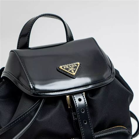 prada medium re-nylon and brushed leather backpack|prada nylon backpack sale.